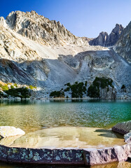 Sticker - Tranquil Mountain Lake with Rugged Peaks