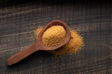 Poster - Organic cane panela powder in the spoon - Saccharum officinarum