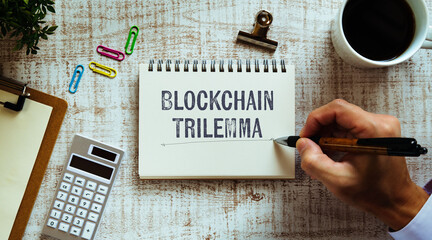 Poster - There is notebook with the word Blockchain Trilemma. It is as an eye-catching image.