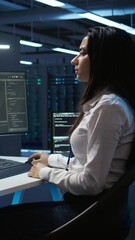Poster - vertical video team of technicians in data center designing, implementing and managing infrastructur