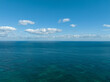 © JinChang - Aerial and summer view of blue sea against sky and horizon at Gimnyeong-ri near Jeju-si, Jeju-do, South Korea