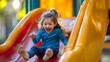 © Pingun - Joyful Children Enjoying a Sunny Day on the Playground Slide