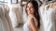 © Oulailux - A woman is smiling in front of a rack of wedding dresses