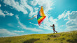 © WETDREAM - A girl is flying a kite in a field