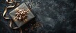 © Boomanoid - Wrapped gift box with golden bow