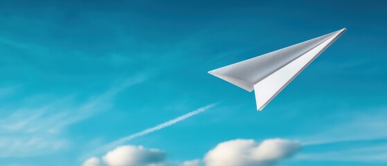 Paper Airplane Flying in Clear Blue Sky with Clouds and Contrail in Background