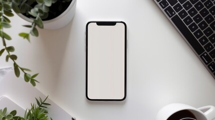 White screen or blank smart phone on white office table, top view.