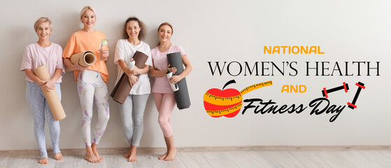 Wall Mural - Group of mature women with yoga mats and water bottles near light wall