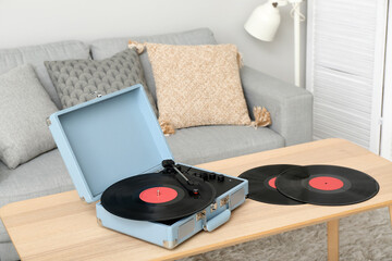 Poster - Record player with vinyl disks on table in living room