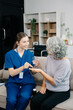 © Nuttapong punna - Caregiver doctor examine older patient use blood pressure gauge. woman therapist nurse at nursing home taking care of senior elderly woman