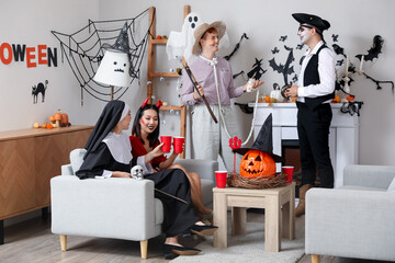 Canvas Print - Group of friends in costumes at Halloween party