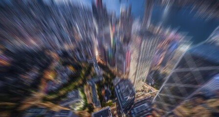 Sticker - An aerial view of Hong Kong at dusk with a radial zoom effect. Buildings and roads are blurred streaks of light.