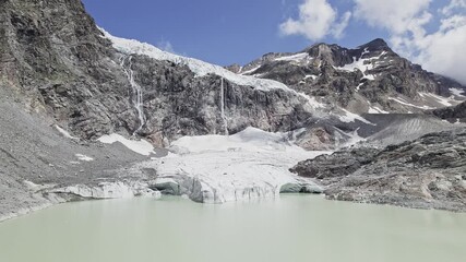 Wall Mural - Flying on Eastern Fellaria glacier, 4k resolution video with professional drone