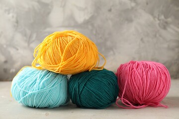 Poster - Different colorful yarns on light table, closeup