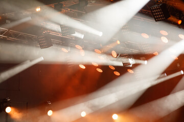 Wall Mural - Red-orange color on stage at a concert