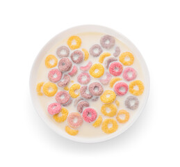 Wall Mural - Bowl of colorful sweet cereal rings with milk on white background