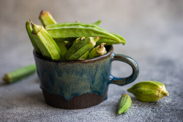 Raw bamia or okra vegetable cooking