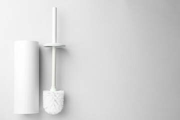 Wall Mural - Toilet brush and holder on white background, top view. Space for text