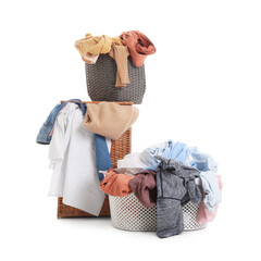 Canvas Print - Laundry baskets with dirty clothes on white background