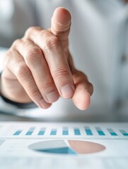 Poster - A close-up shot of an investor's hand pointing to different sections of an asset allocation pie chart, highlighting the importance of distribution across various asset classes