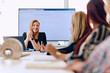 © .shock - Professional Businesswomen Leading Meeting on New Projects in Modern Office.