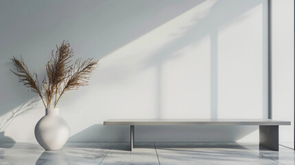 Aufkleber - Sleek interior design showcasing a concrete bench and a vase of pampas grass, bathed in soft natural light