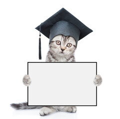 Poster - Smart cat wearing black graduation cap holds blank white board. isolated on white background