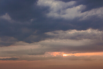 Wall Mural - overcast sky with clouds at sunset. cloudy weather forecast
