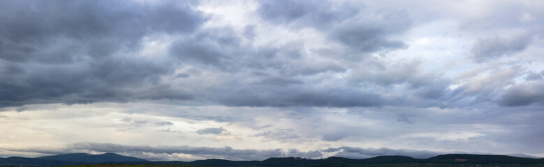 Wall Mural - panorama of overcast sky with clouds. cloudy weather forecast