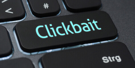 Wall Mural - illuminated keyboard with a labeled key - clickbait