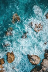 Canvas Print - A rocky shoreline with a large body of water in the background