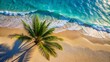 © Matan - abstract sand beach with palm leaf shadow and blue water wave from above, summer vacation outdoors in tropical paradise nature, background with space