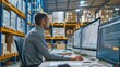 © Borin - A logistics manager reviewing inventory control charts and graphs on a computer screen.