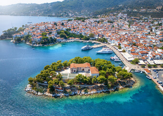 Wall Mural - aerial view of skiathos town with old port and bourtzi peninsula, sporades islands, greece