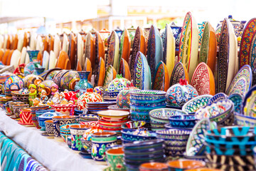 Wall Mural - Multicolored ceramic dishes with oriental ornaments at the Siab Bazaar.