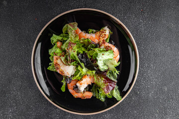 Sticker - shrimp salad prawns or langoustines green leaf lettuce mix fresh meal food snack on the table copy space food background rustic top view 