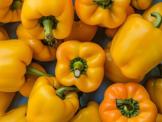 Poster - Aerial View of Symmetrical Pattern of Vibrant Yellow Bell Peppers - Detailed Geometric Textured Backgrounds with Soft Lighting
