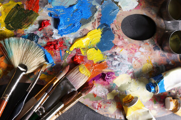 Sticker - Artist's palette, brushes and paints on grey table, flat lay