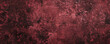 © Volodymyr - A dark burgundy background with a textured, grungy appearance, featuring scratches and splatters in shades of black and dark burgundy.