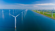 © Fokke Baarssen - Sustainable Wind Energy Generation Amidst Stunning Dutch Coastal Landscape