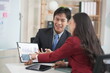 © MrAshi - Young Asian couple celebrating together Look at the laptop computer in the home office. successful work To start a small business Asian couple calculates budget or expenses by holding bills at home
