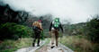 © peopleimages.com - Back, stick or friends on trail hiking outdoor adventure or journey in nature or forest for mountain travel. Clouds, workout and people in woods for holiday, walking or trekking to explore in France
