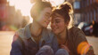 © Bogdan Pictures - Amid a stunning sunset, two vibrant young women embrace, sharing a joyful moment that captures their deep friendship and happiness in a serene urban setting as city lights twinkle