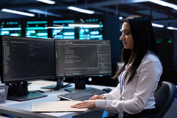Poster - data center manager checking emergency procedures documents to ensure company continuity in case of 