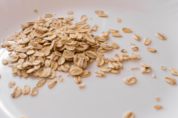 pile of oatmeal isolated on white background
