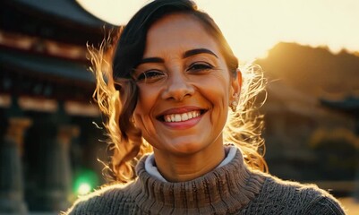 Wall Mural - Headshot portrait video of a grinning woman in her 30s wearing a cozy sweater against an ancient temple or shrine background