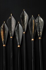 Poster - A set of four arrows with black and gold colors, suitable for various designs and compositions