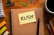 © hogehoge511 - There is sticky note with the word RUSH. It is as an eye-catching image.