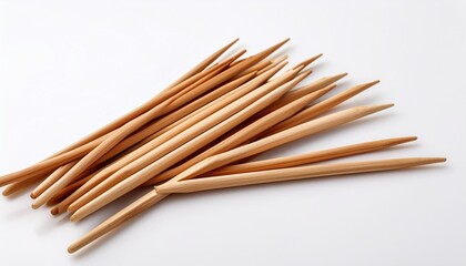 wooden stirrers for coffee tea and drinks laid out in random order isolated on a white background