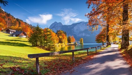 Poster - wonderful autumn landscape beautiful romantic alley near popular alpine lake grundlsee with colorful trees scenic image of forest landscape at sunny day stunning nature background